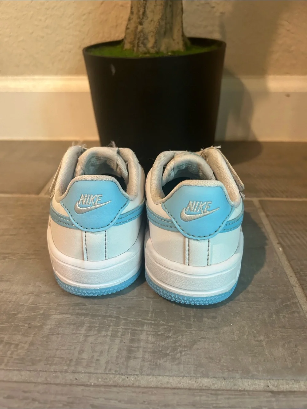 Nike Kids White Sneakers with Light Blue Accents